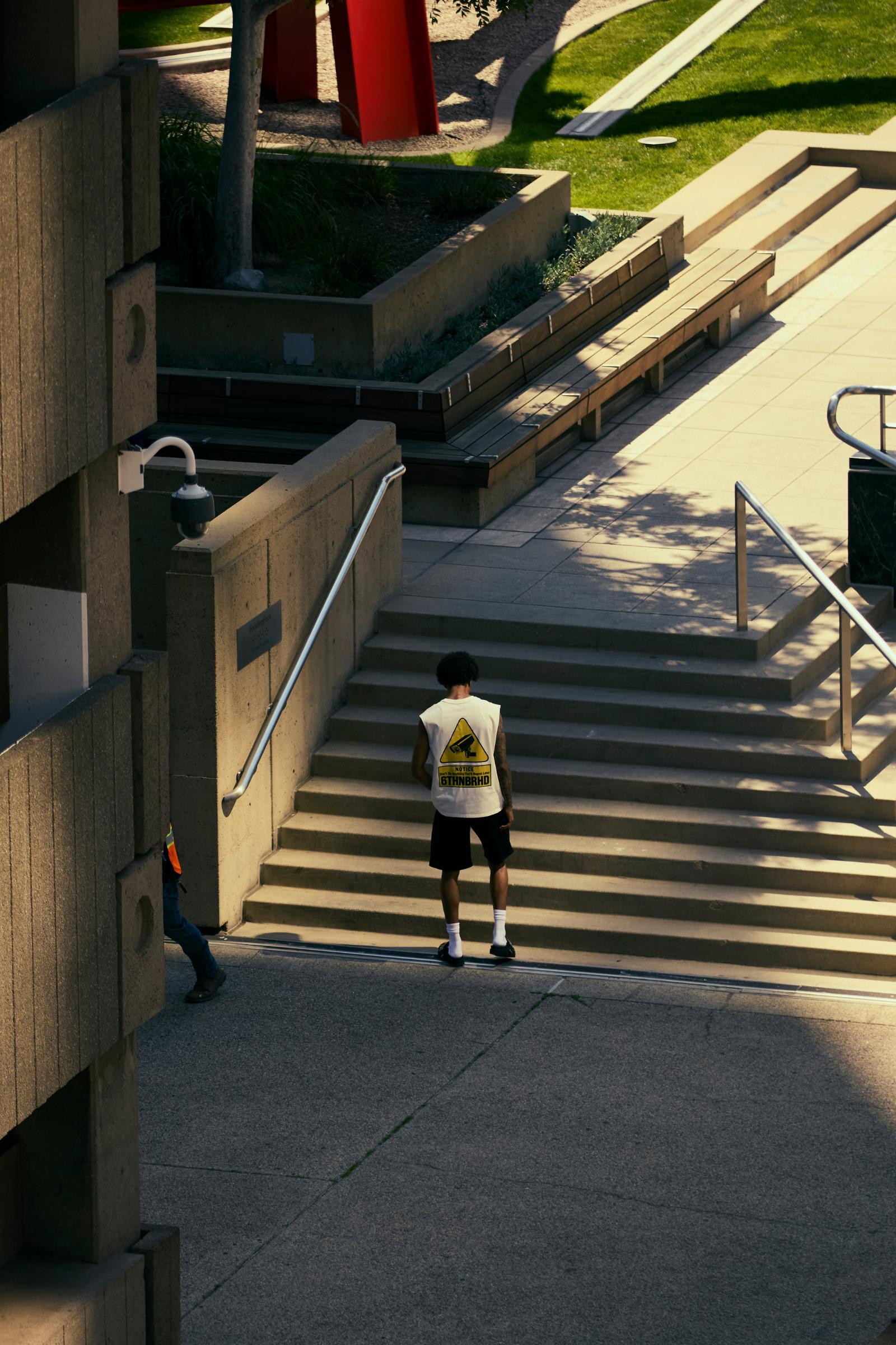 "Notice" Graphic Sleeveless Tee White