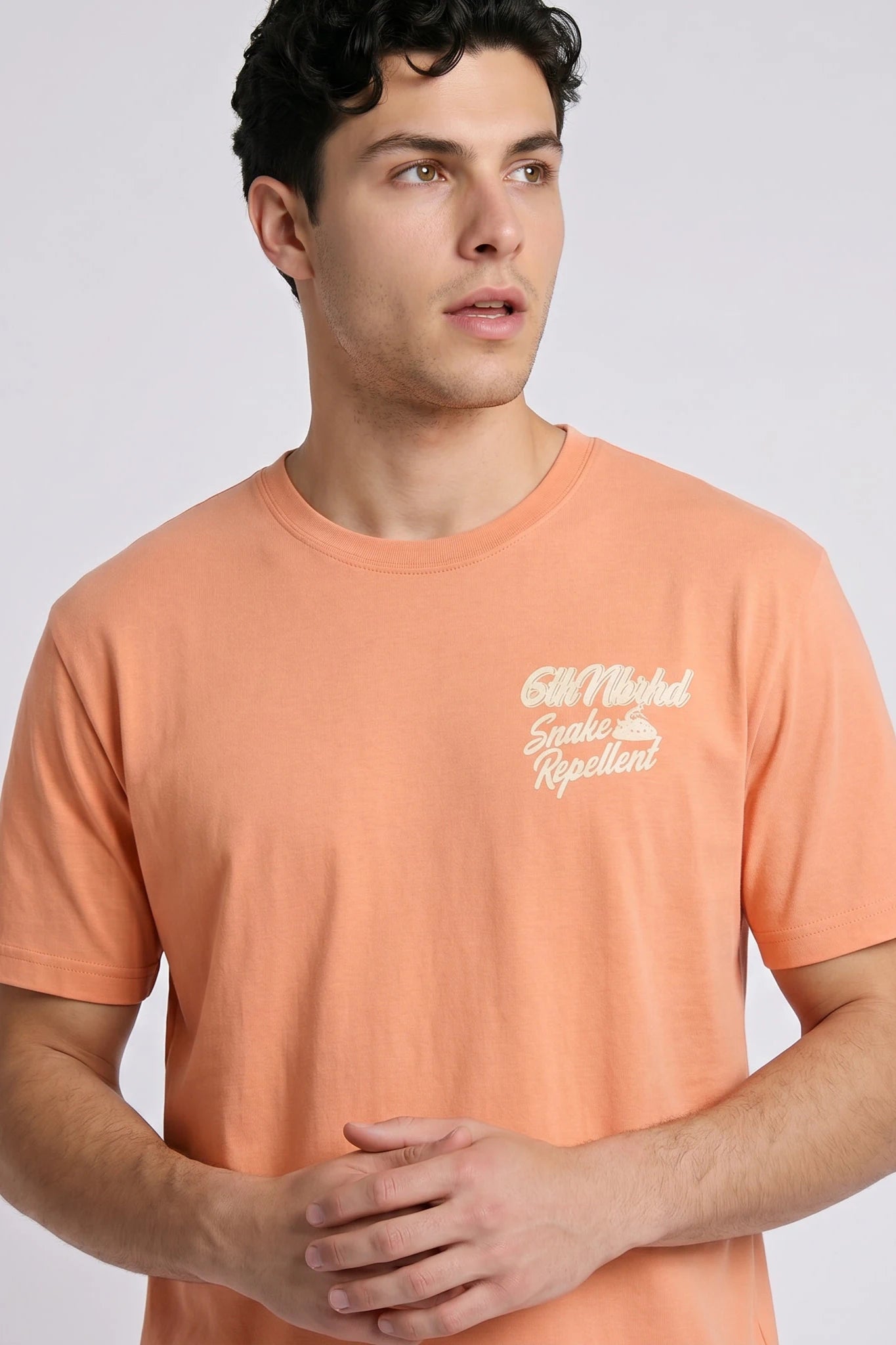 "Snake Repellent" Graphic Tee Peach