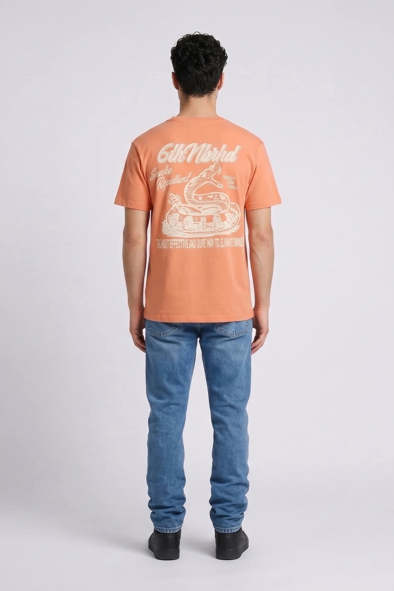"Snake Repellent" Graphic Tee Peach