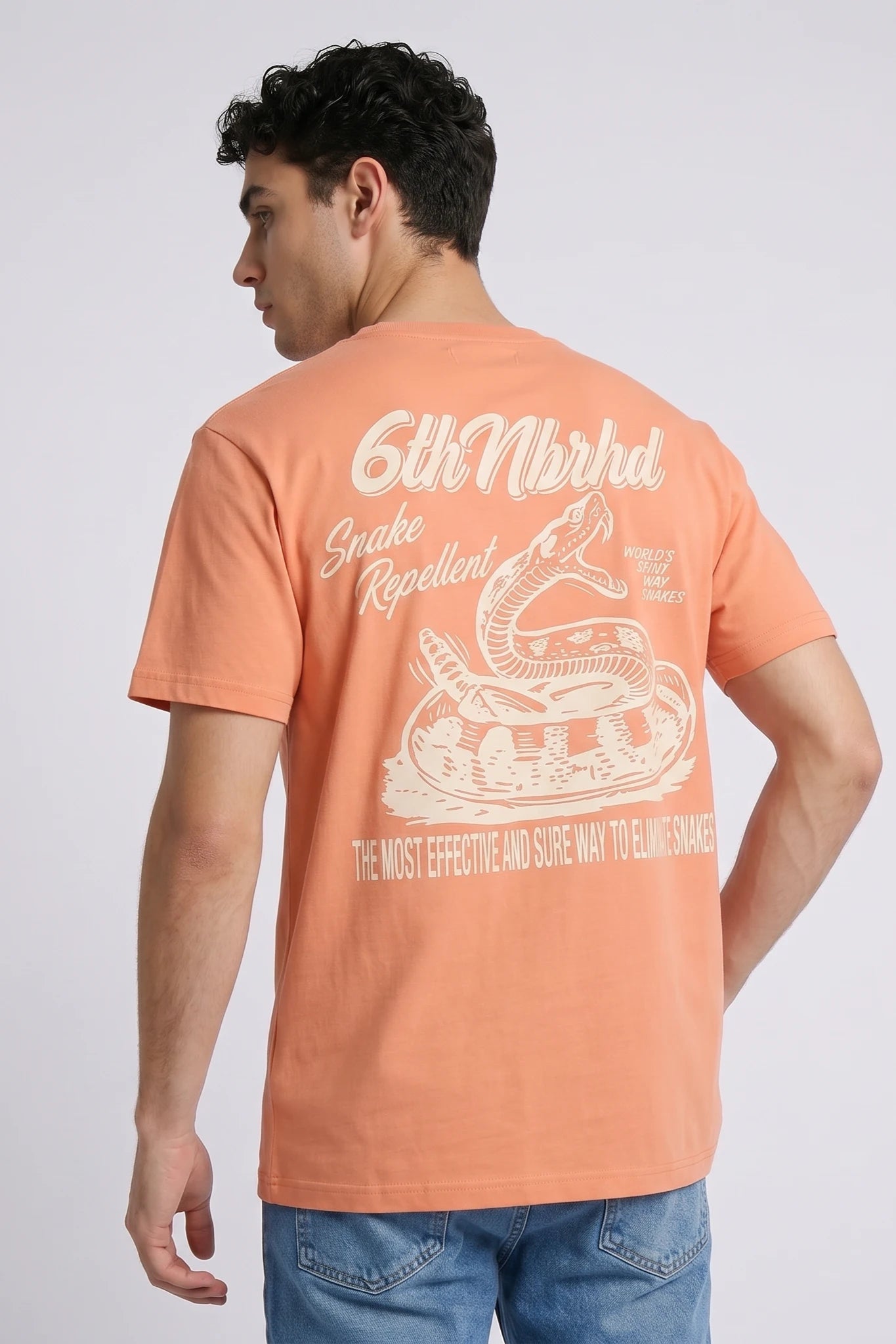 "Snake Repellent" Graphic Tee Peach